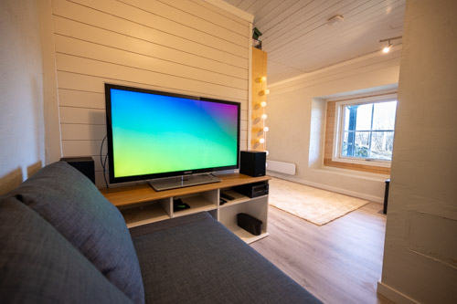 The cellar TV lounge area